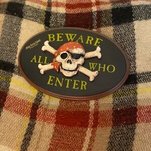Small plaque- beware all who enter